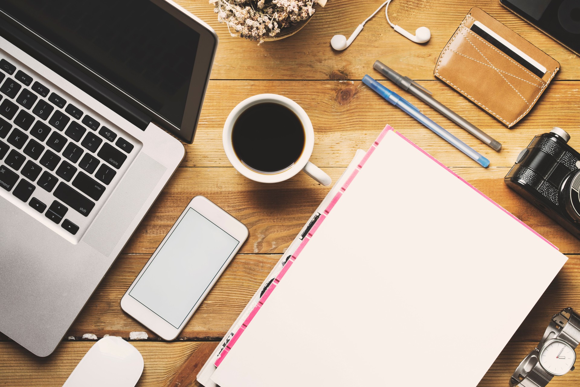 White cover magazine and blank screen phone, tabletop flat lay